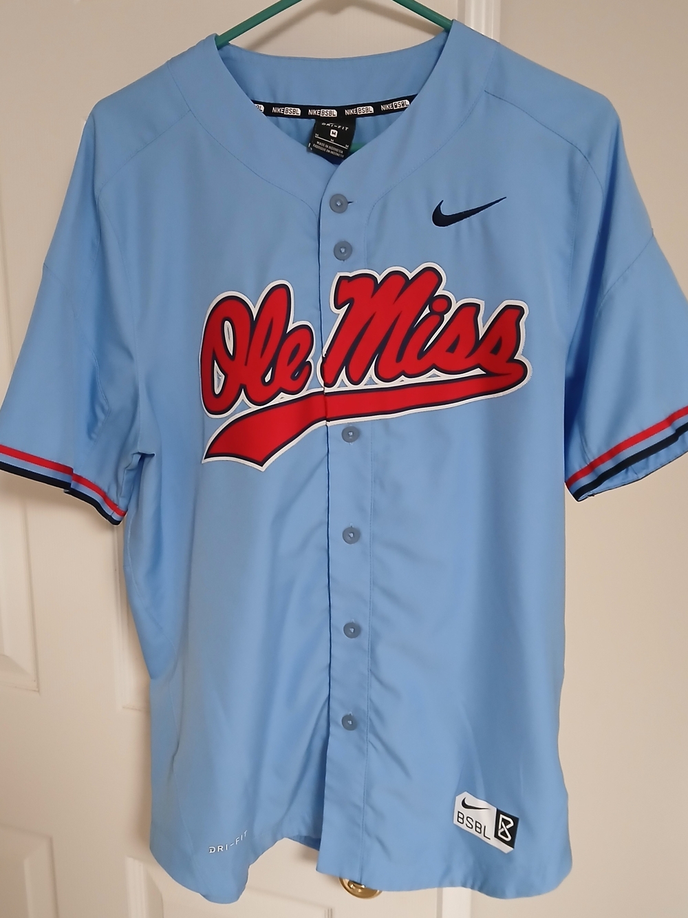 Nike Ole Miss Light Blue Baseball Jersey with Red Script